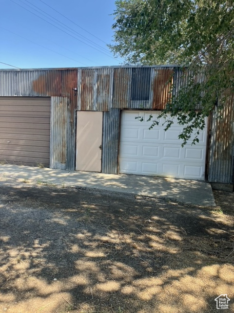 Exterior space with a garage