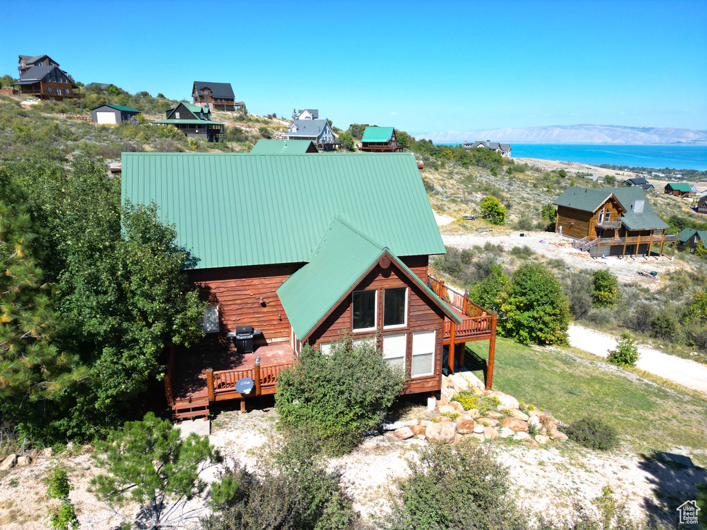 Birds eye view of property with a mountain view