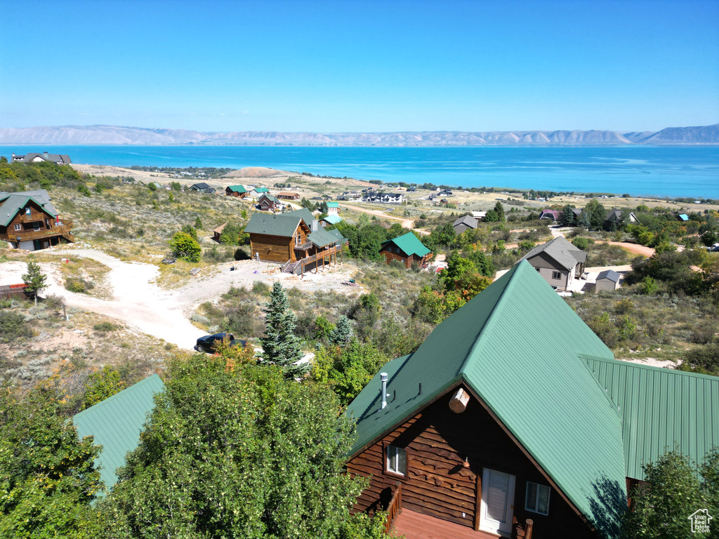 Bird\'s eye view with a water and mountain view