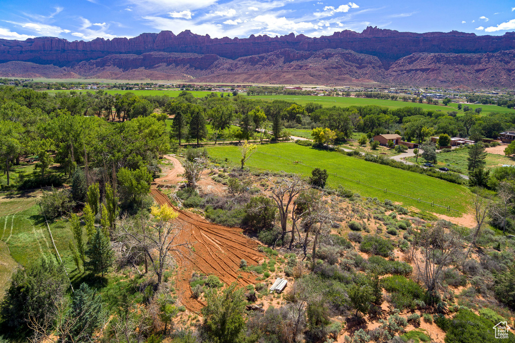 View of mountain backdrop with rural landscape