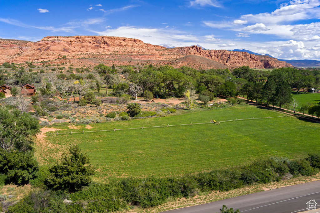 View of mountain backdrop featuring rural landscape