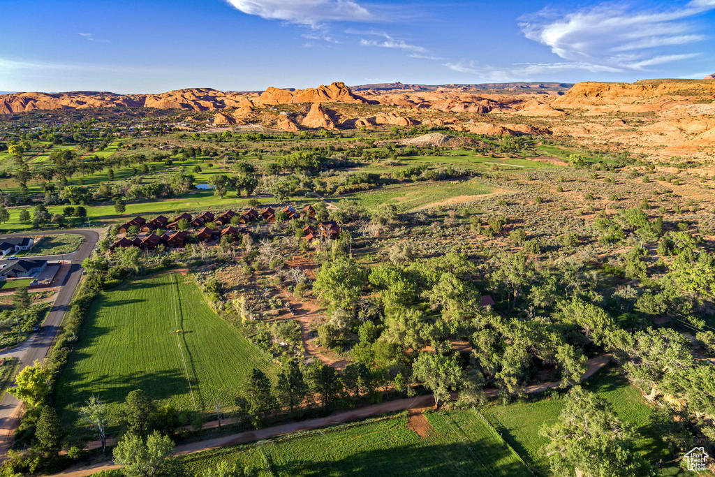 Aerial view of property's location with a mountainous background