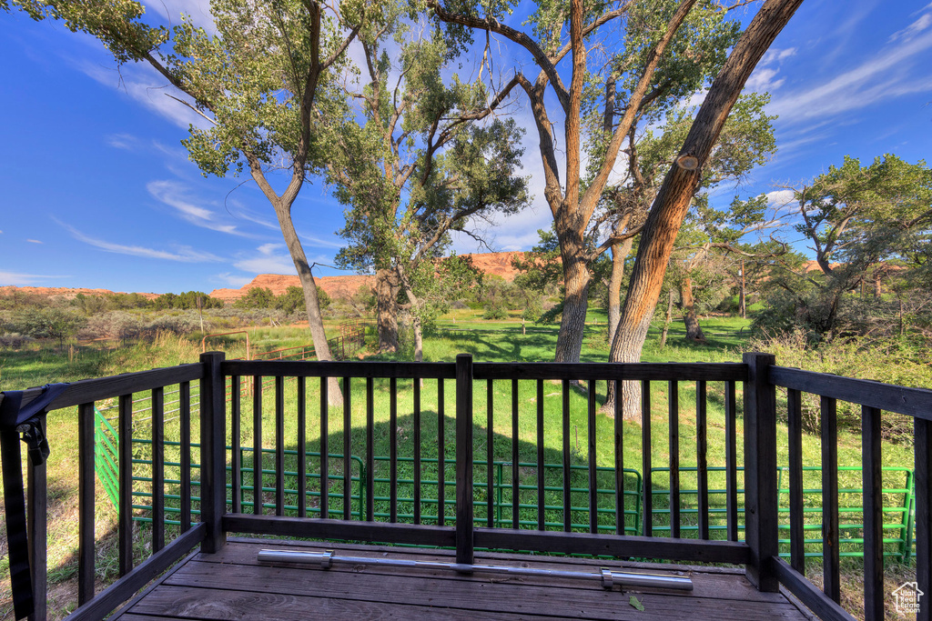 Deck featuring a lawn