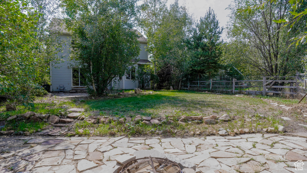 View of yard with a patio