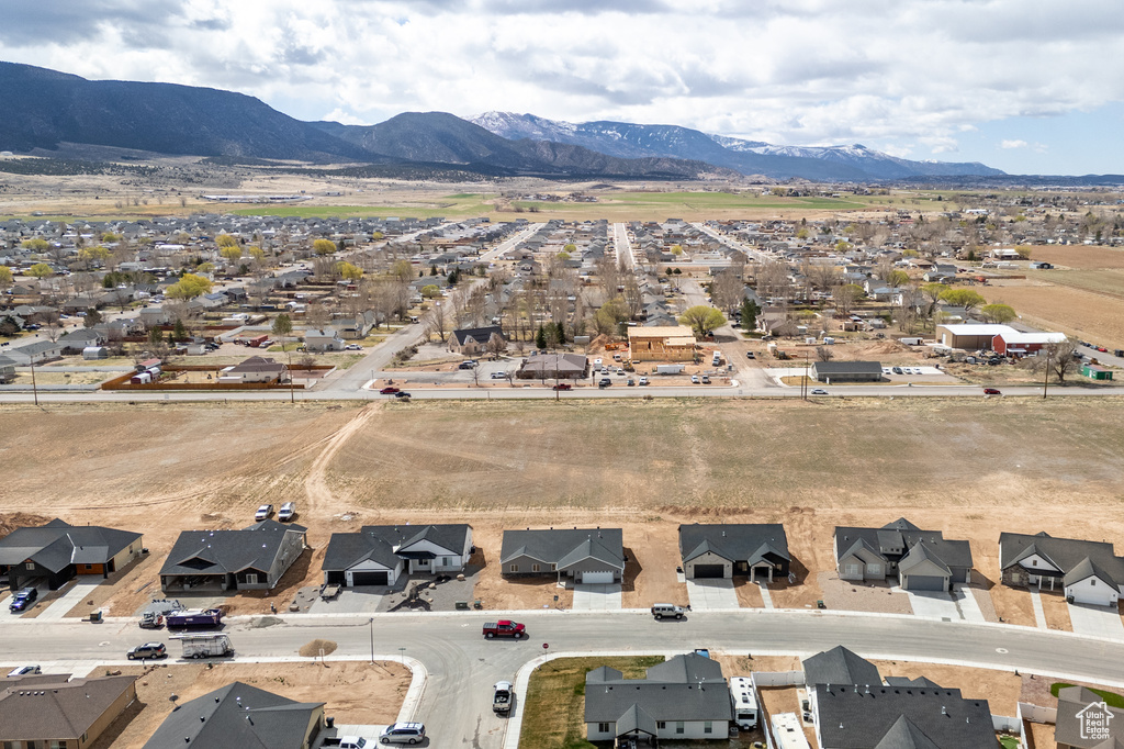 Drone / aerial view featuring a residential view and a mountain view