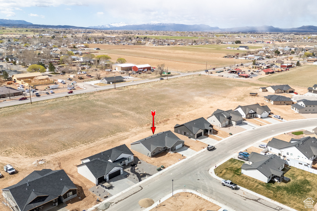 Birds eye view of property featuring a residential view and a mountain view