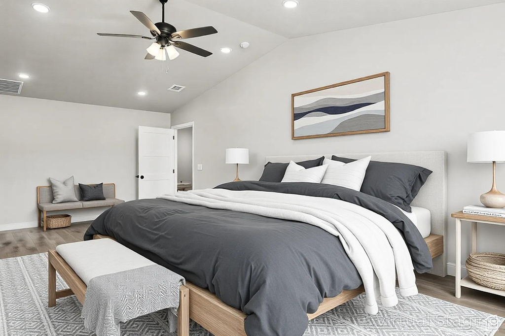 Bedroom with visible vents, recessed lighting, wood finished floors, and lofted ceiling