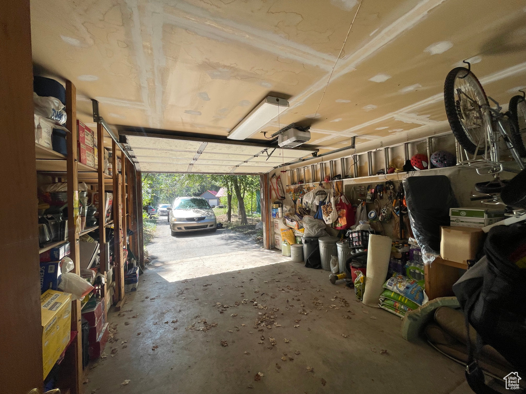 Garage featuring a garage door opener