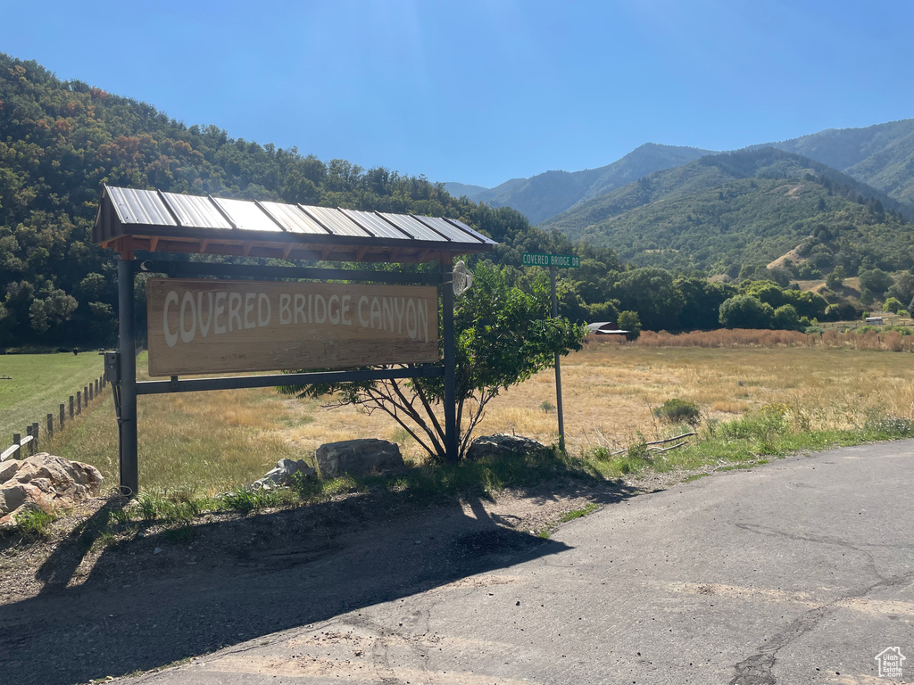 View of yard featuring a mountain view and a rural view