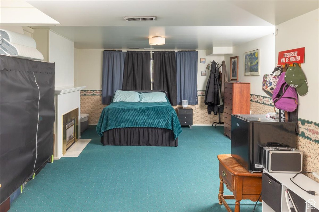 Bedroom with carpet flooring