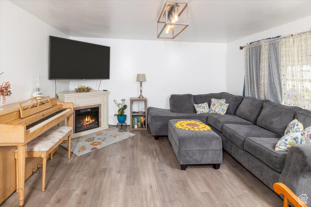 Living room with light wood-type flooring