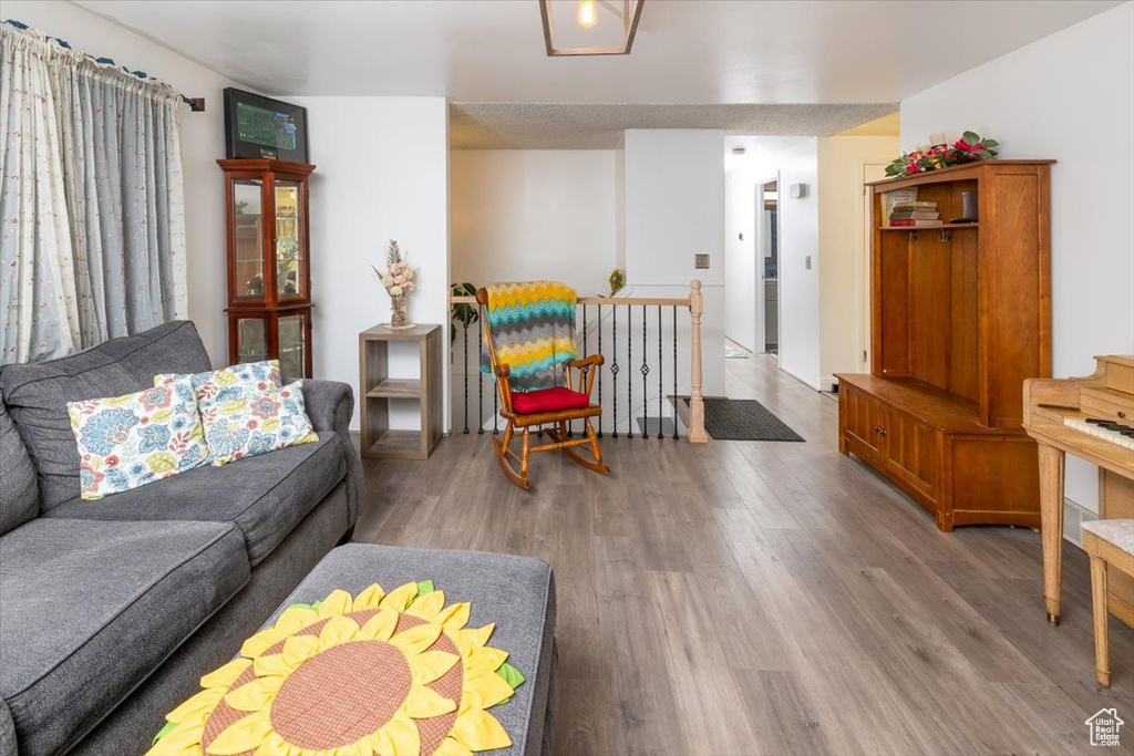 Living room featuring hardwood / wood-style floors