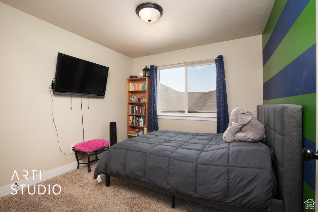 Bedroom with carpet floors