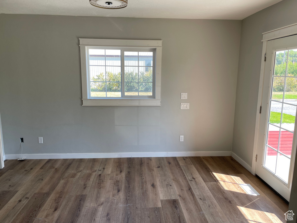 Unfurnished room featuring hardwood / wood-style floors