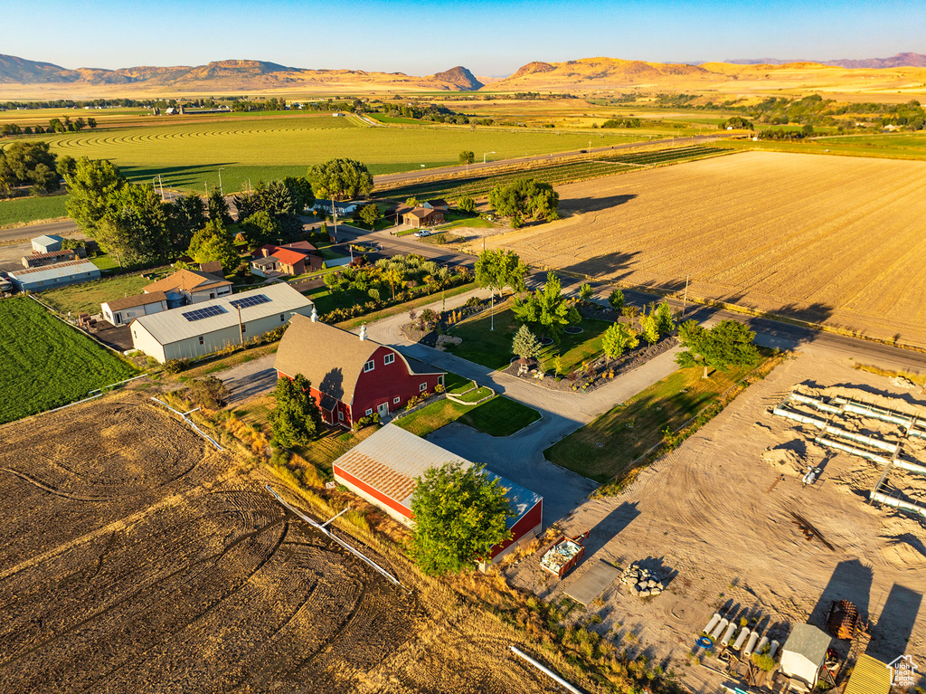 Birds eye view of property with a rural view and a mountain view