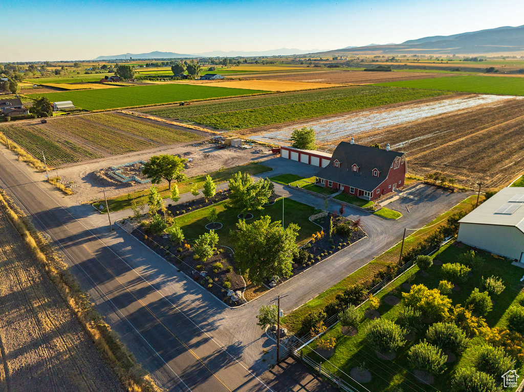 Birds eye view of property with a rural view