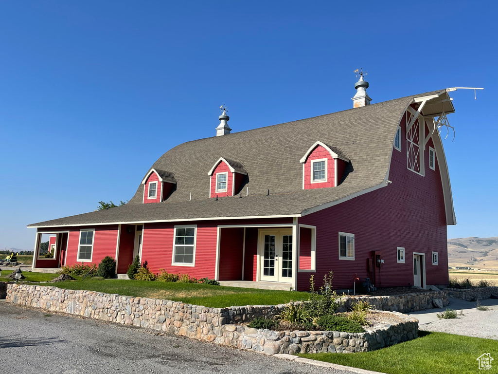 Cape cod-style house with french doors