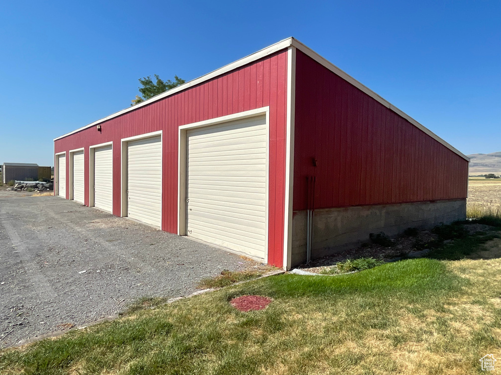Garage with a lawn