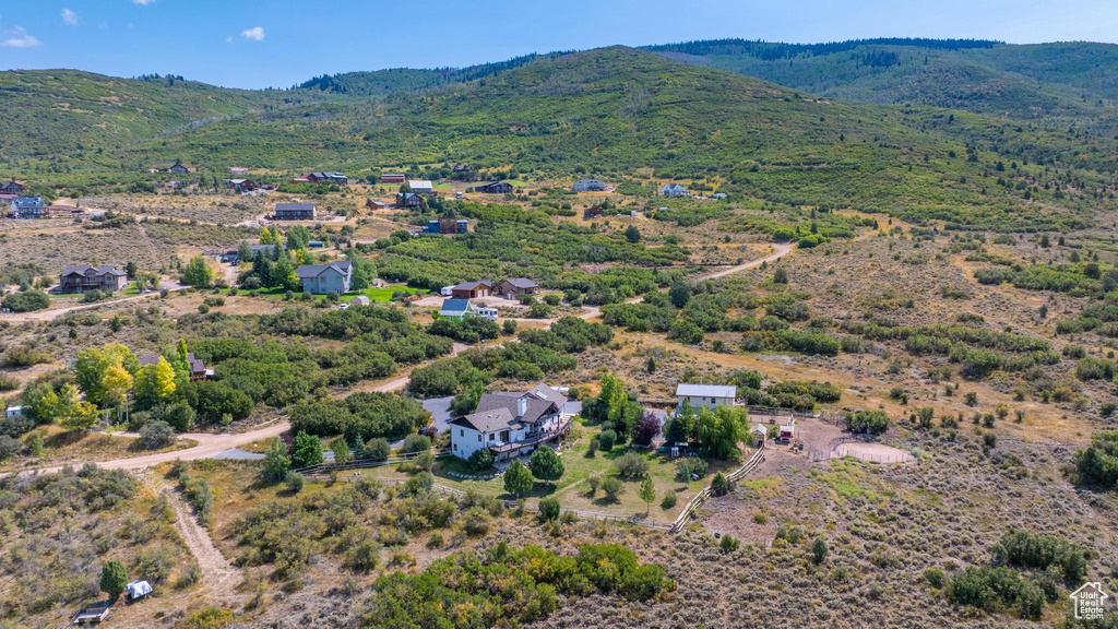 Drone / aerial view featuring a mountain view