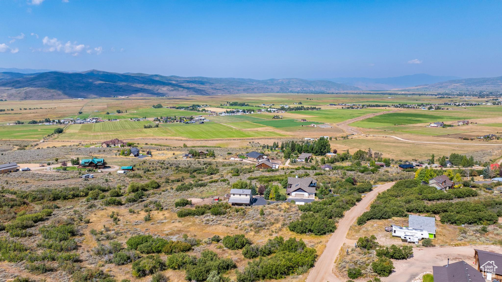 Drone / aerial view featuring a mountain view and a rural view