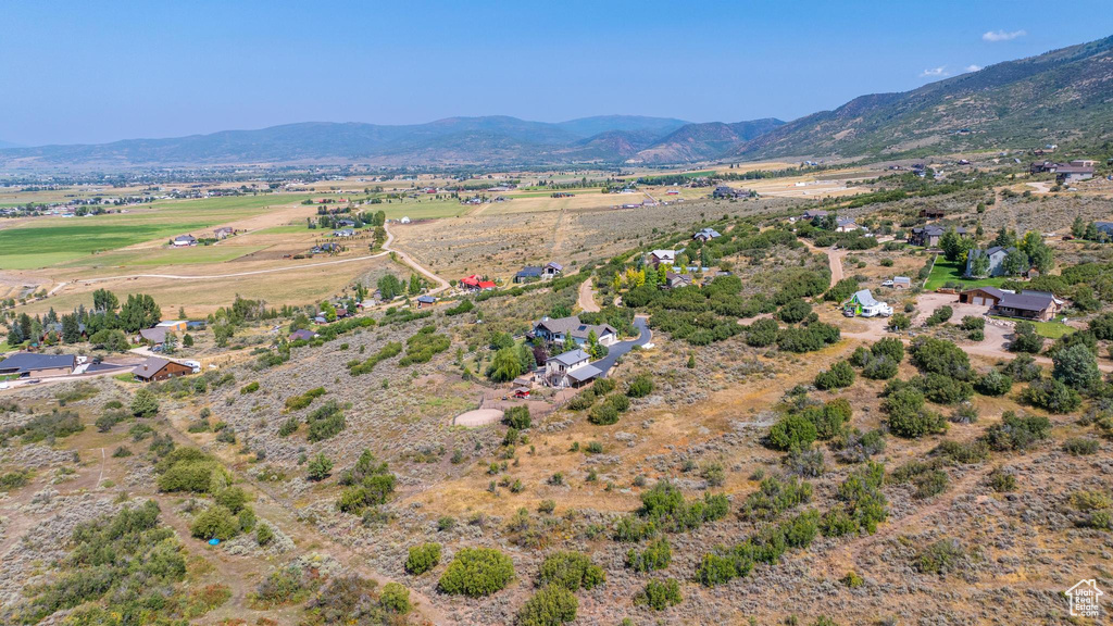 Drone / aerial view with a mountain view and a rural view