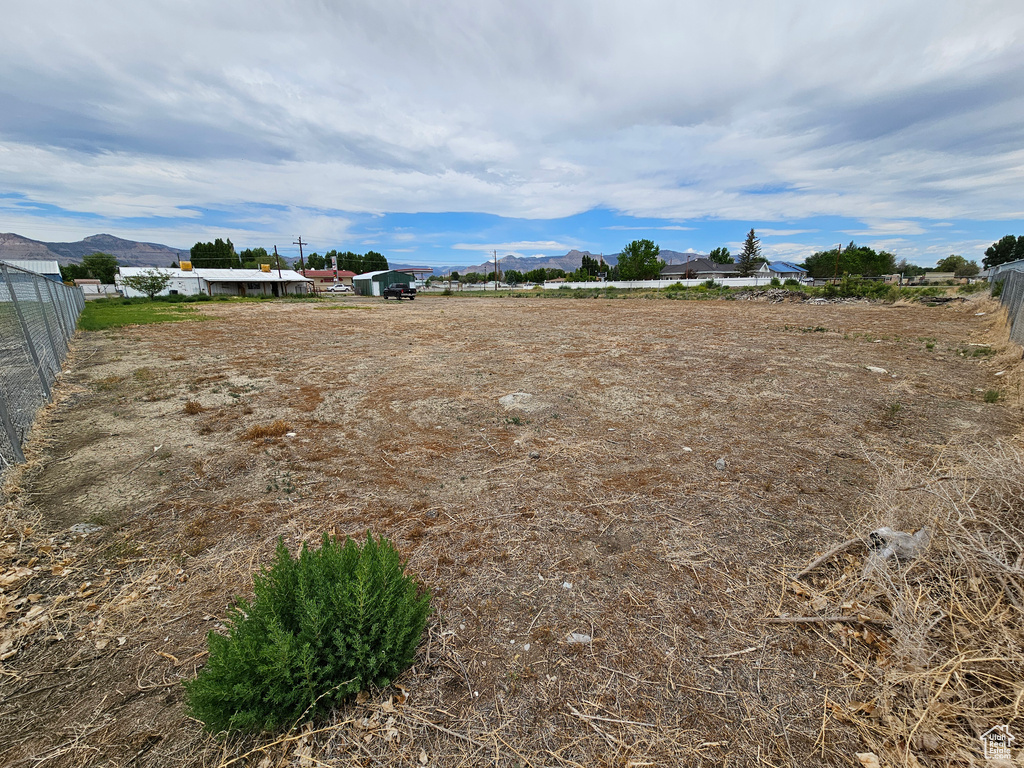 View of yard with a mountain view