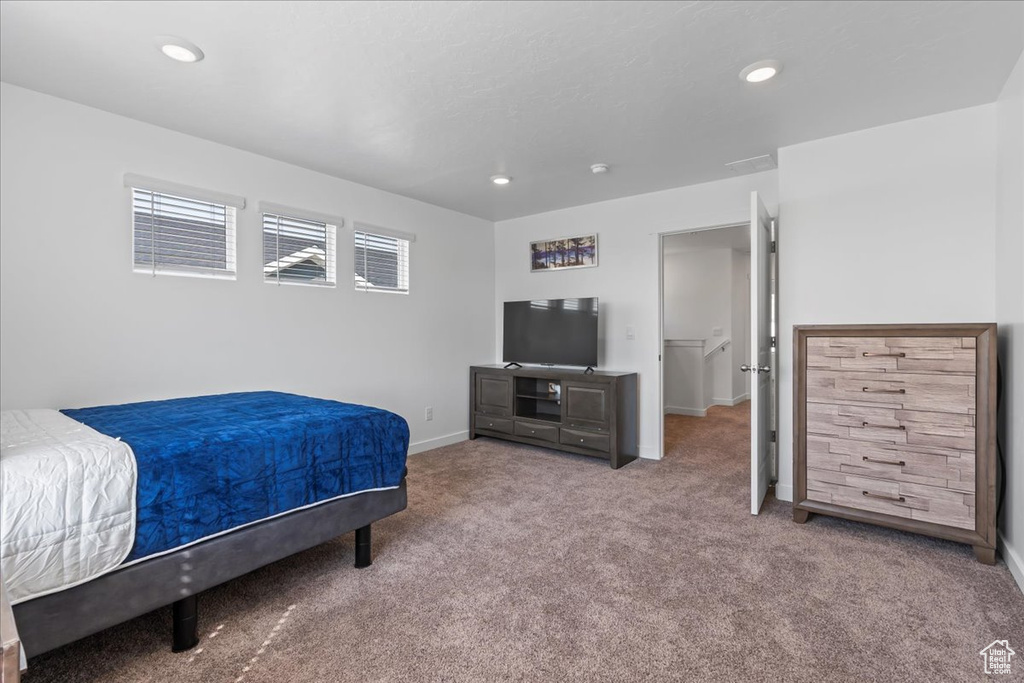 Bedroom featuring carpet