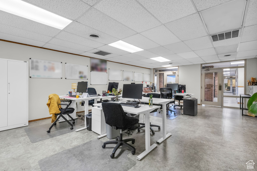 Home office with a drop ceiling