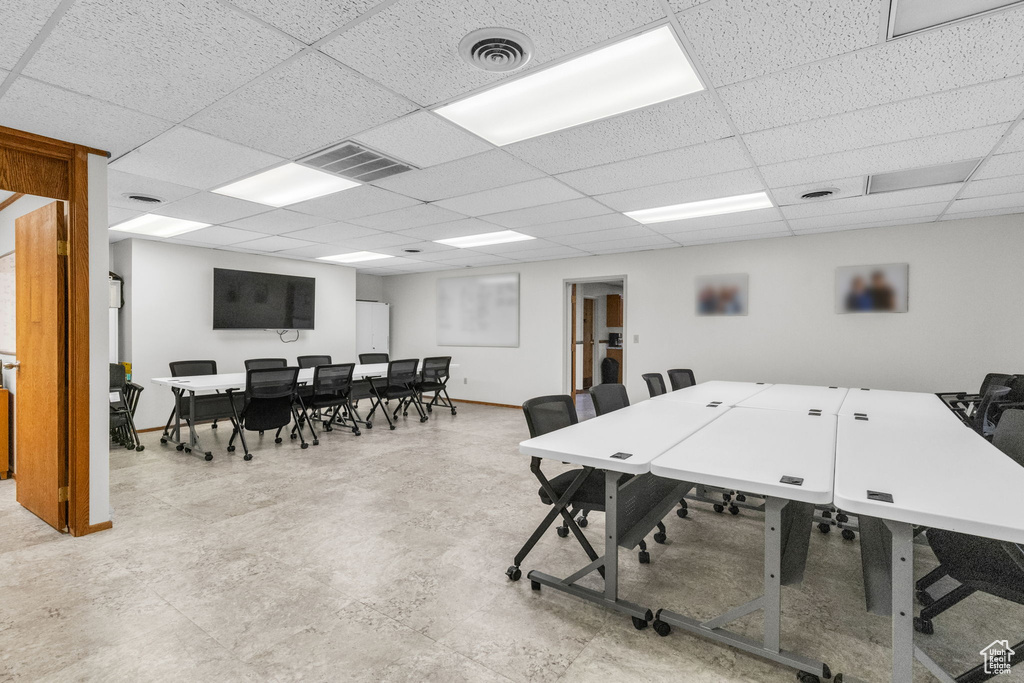 Home office featuring a drop ceiling