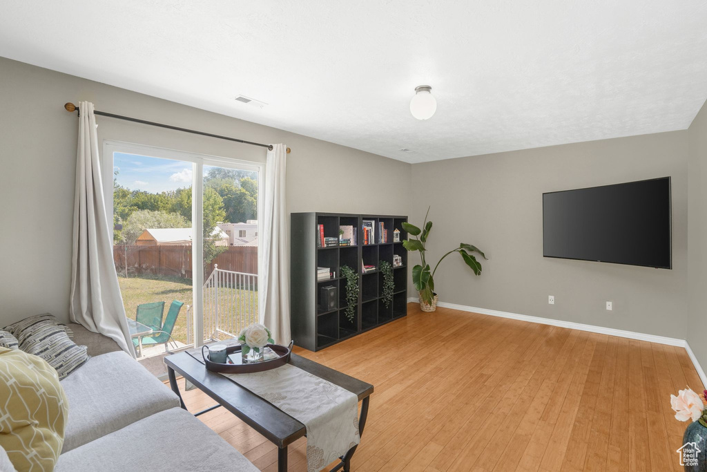 Living room featuring light hardwood / wood-style flooring