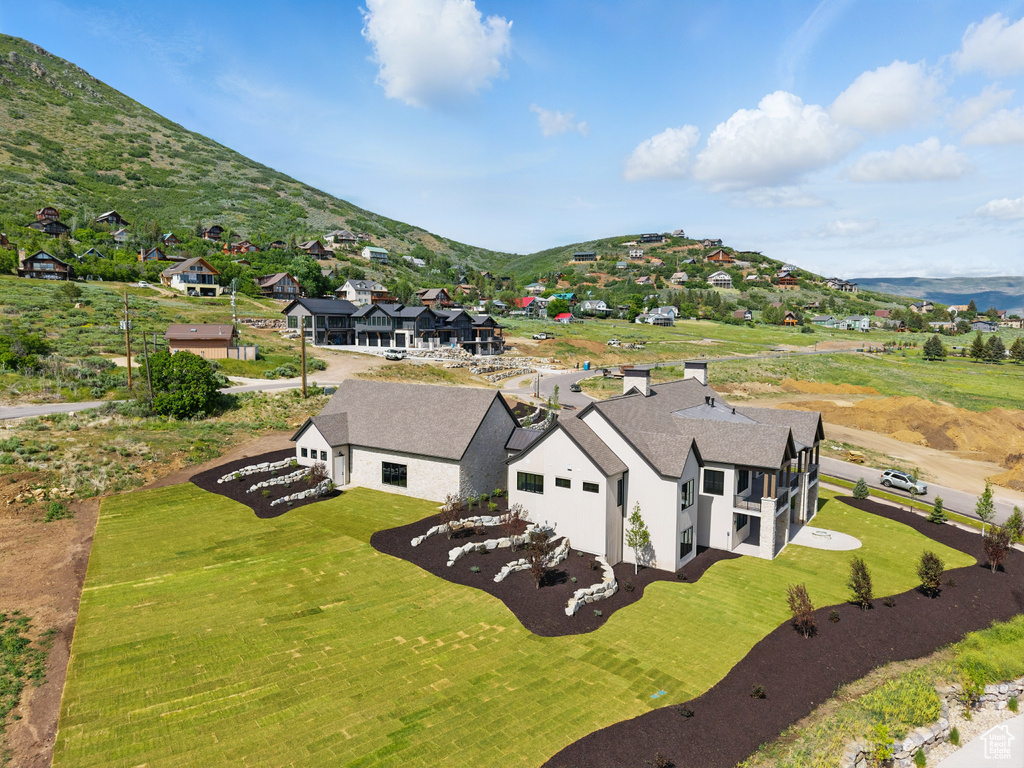 Aerial perspective of suburban area featuring mountains