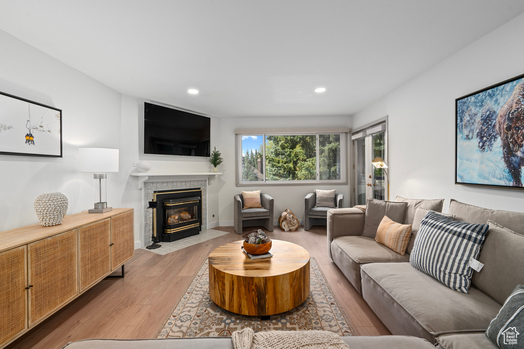 Living room with light wood-type flooring