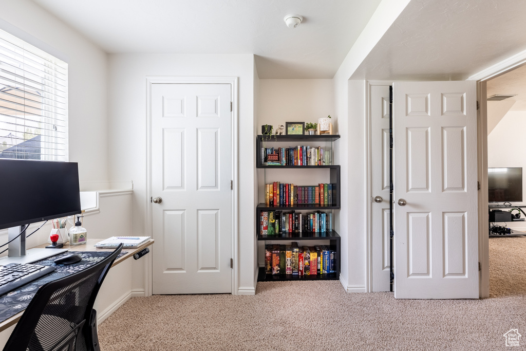 View of carpeted home office