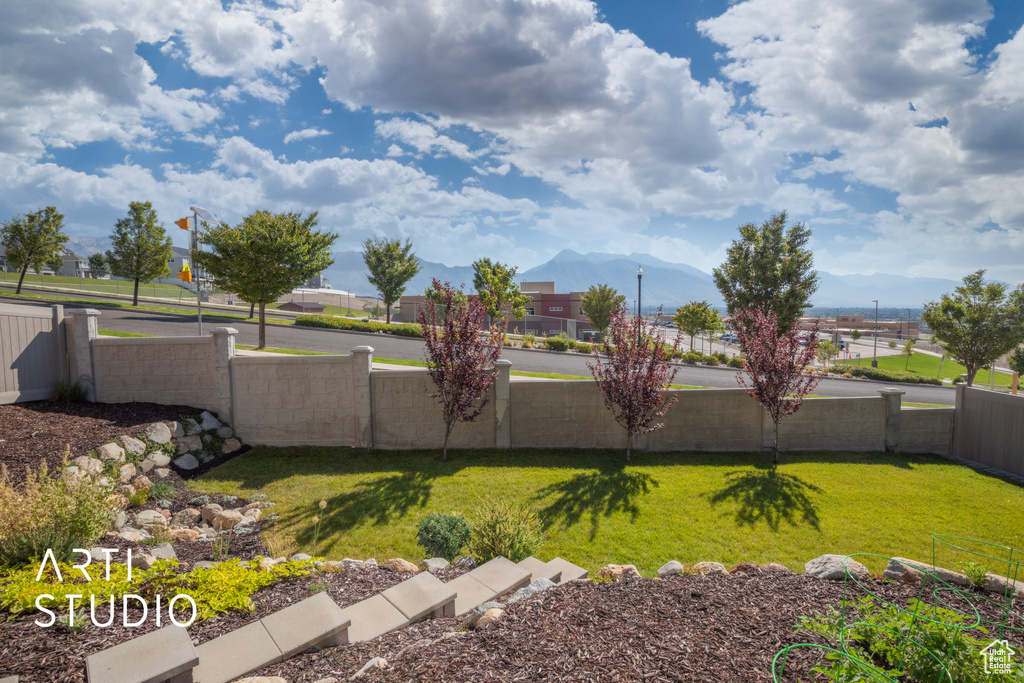 View of yard with a mountain view