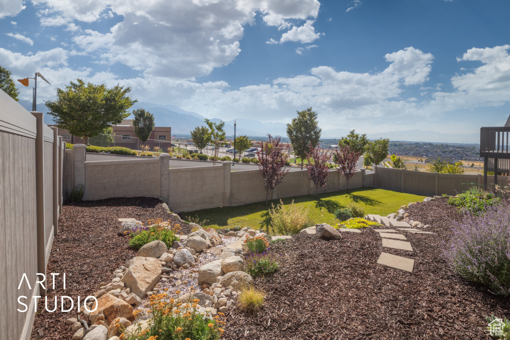 View of yard with a mountain view