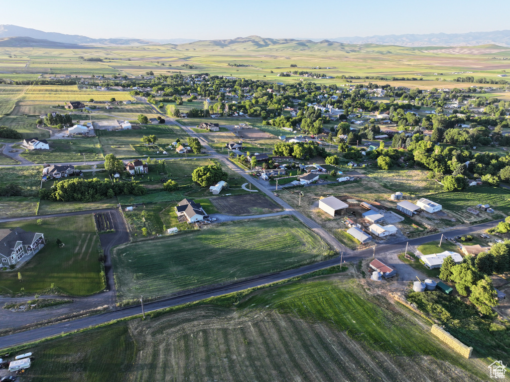 Birds eye view of property featuring a mountain view and a rural view