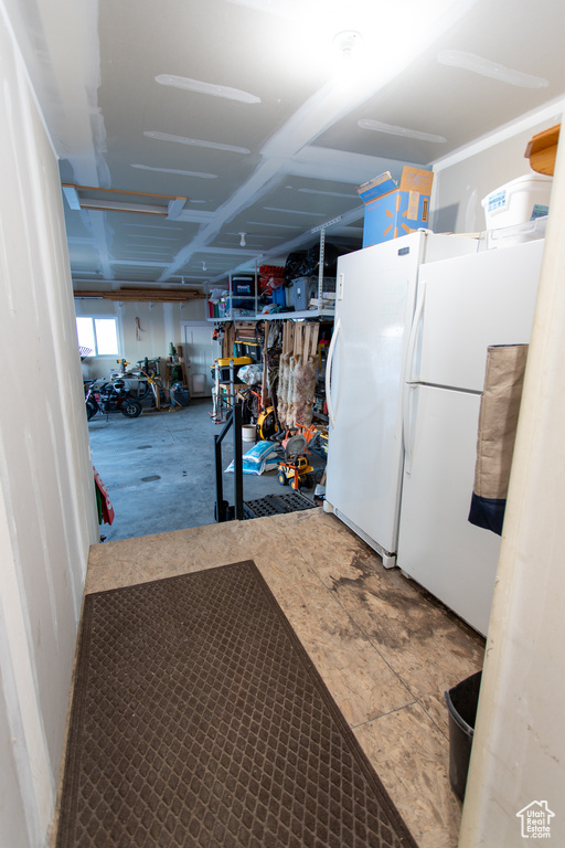 Interior space with white fridge