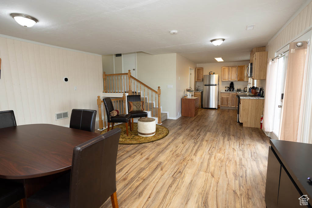 Dining area featuring light hardwood / wood-style floors