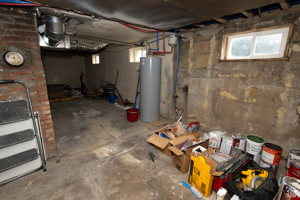 Basement featuring water heater