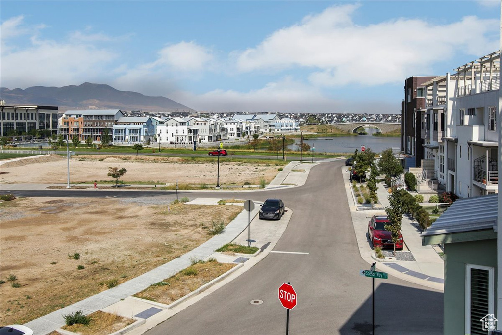 View of road with a water and mountain view