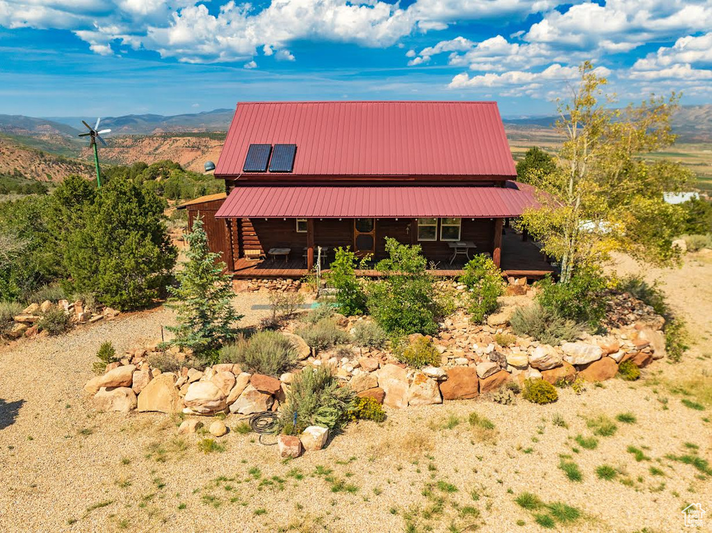 View of front of property with a mountain view