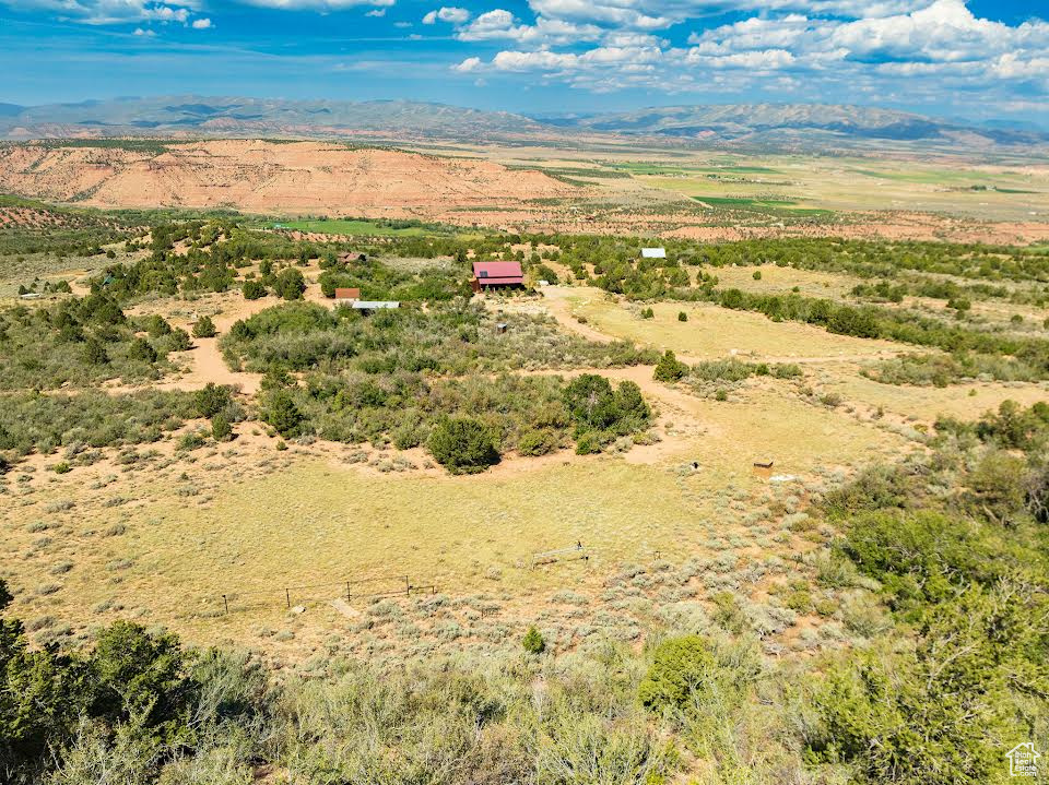 Drone / aerial view featuring a mountain view and a rural view