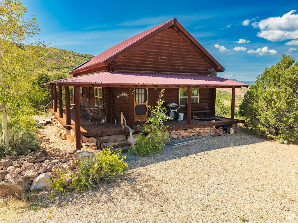 Exterior space with a porch