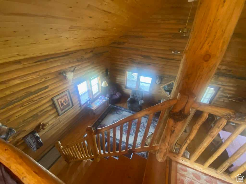 Stairway with hardwood / wood-style floors