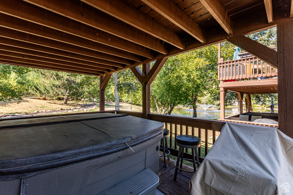 Deck featuring a hot tub