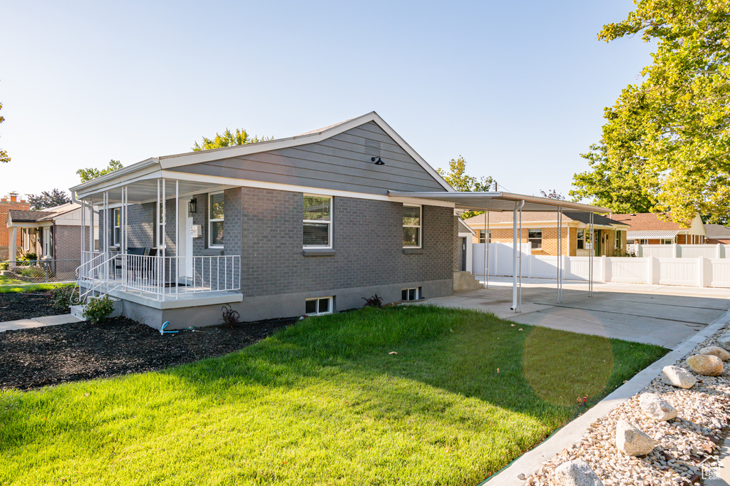 Exterior space with a lawn