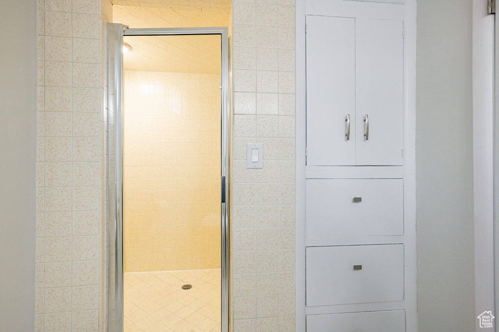 Bathroom featuring a shower with shower door