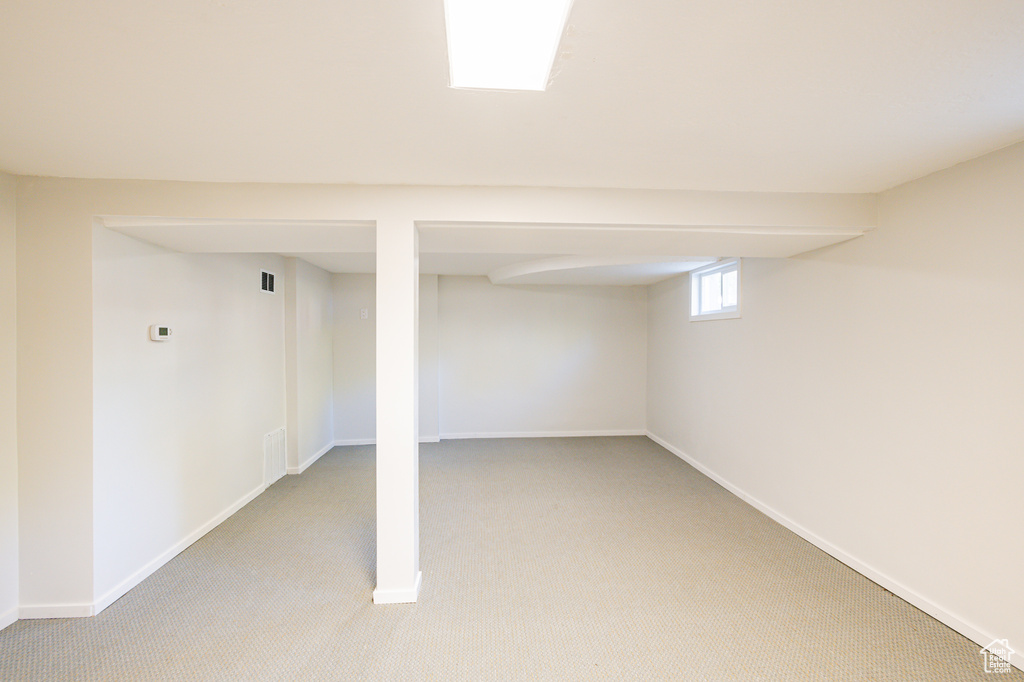 Basement with carpet floors