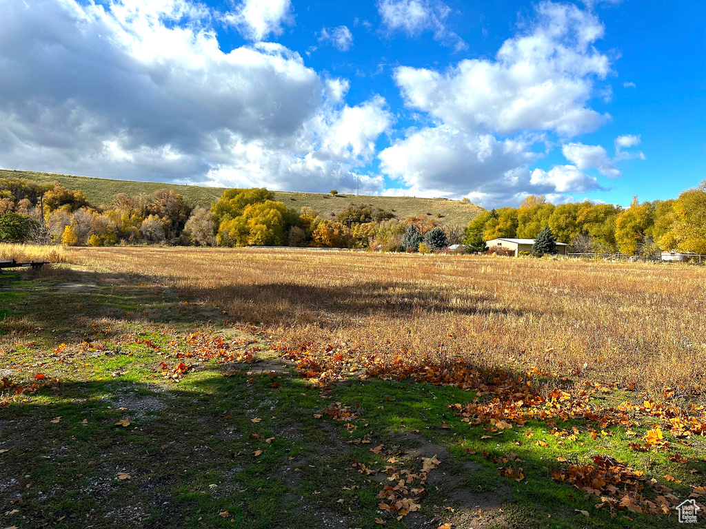 View of mountain feature with a rural view