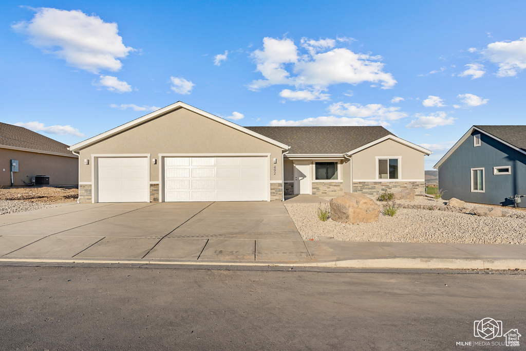 Single story home with a garage